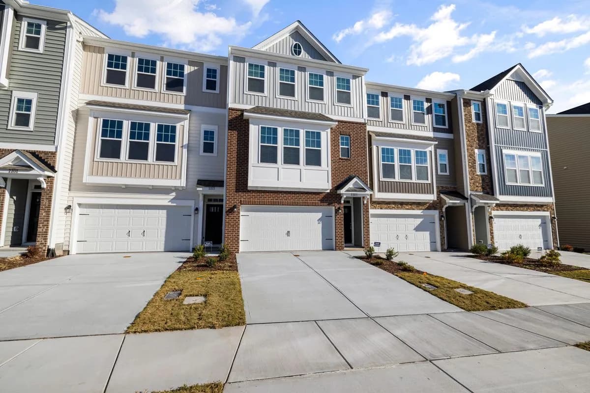 Residential exteriors with siding and gutter systems