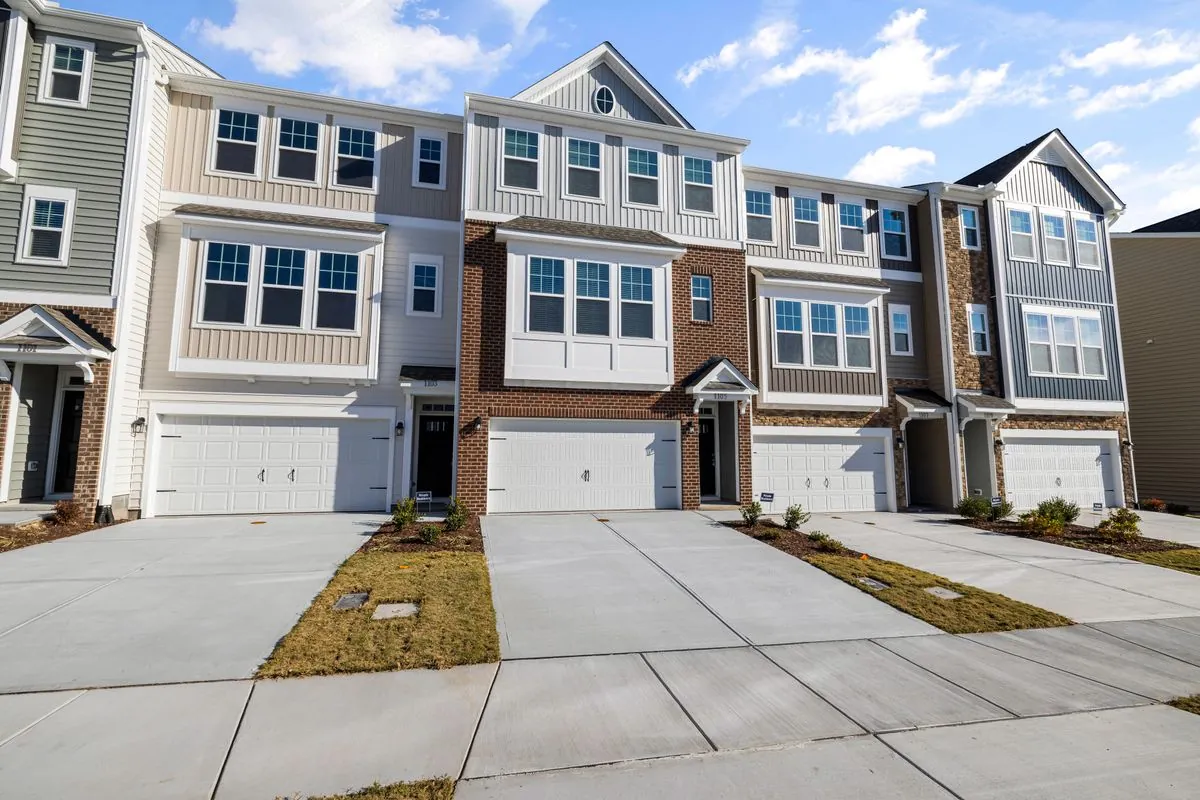 Residential exteriors with siding and gutter systems